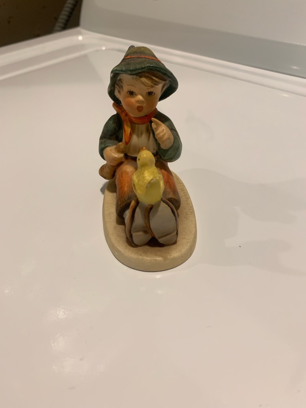 Porcelain Boy Figurine with Yellow Chick